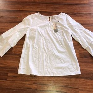 Very pretty brand new top with tags